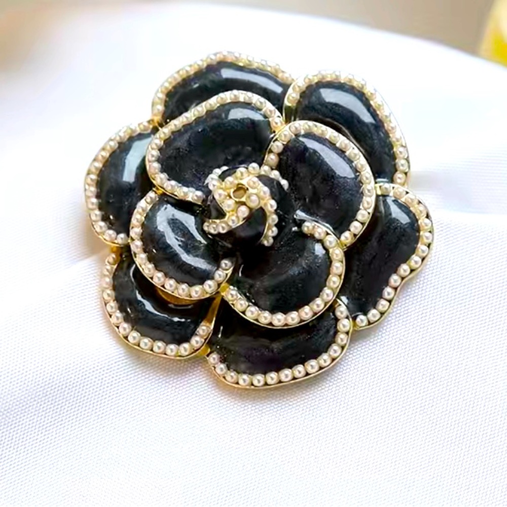 Brand New Camelia Brooch comes in a box